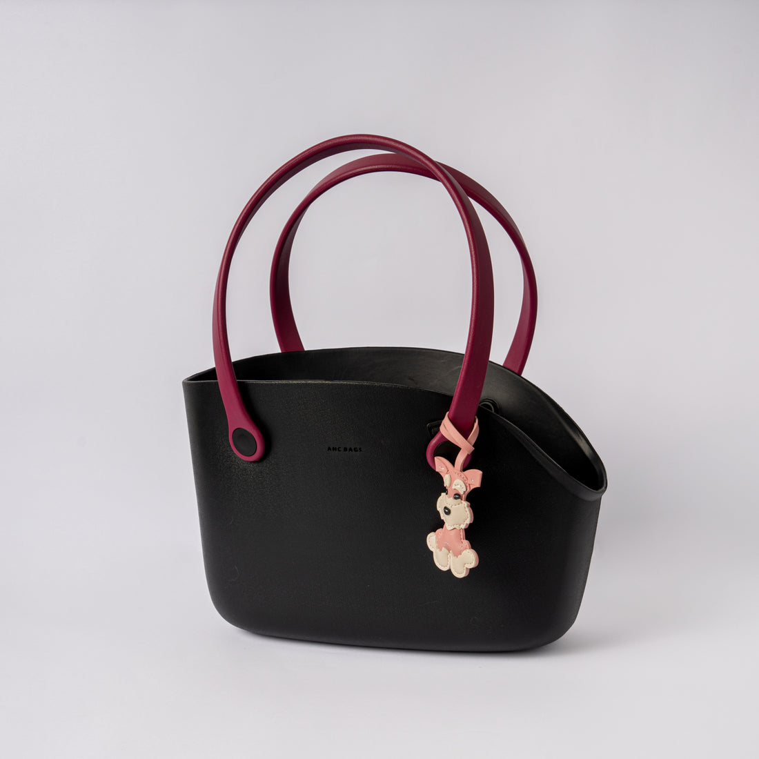 PET BAG CON ASAS PURPURA